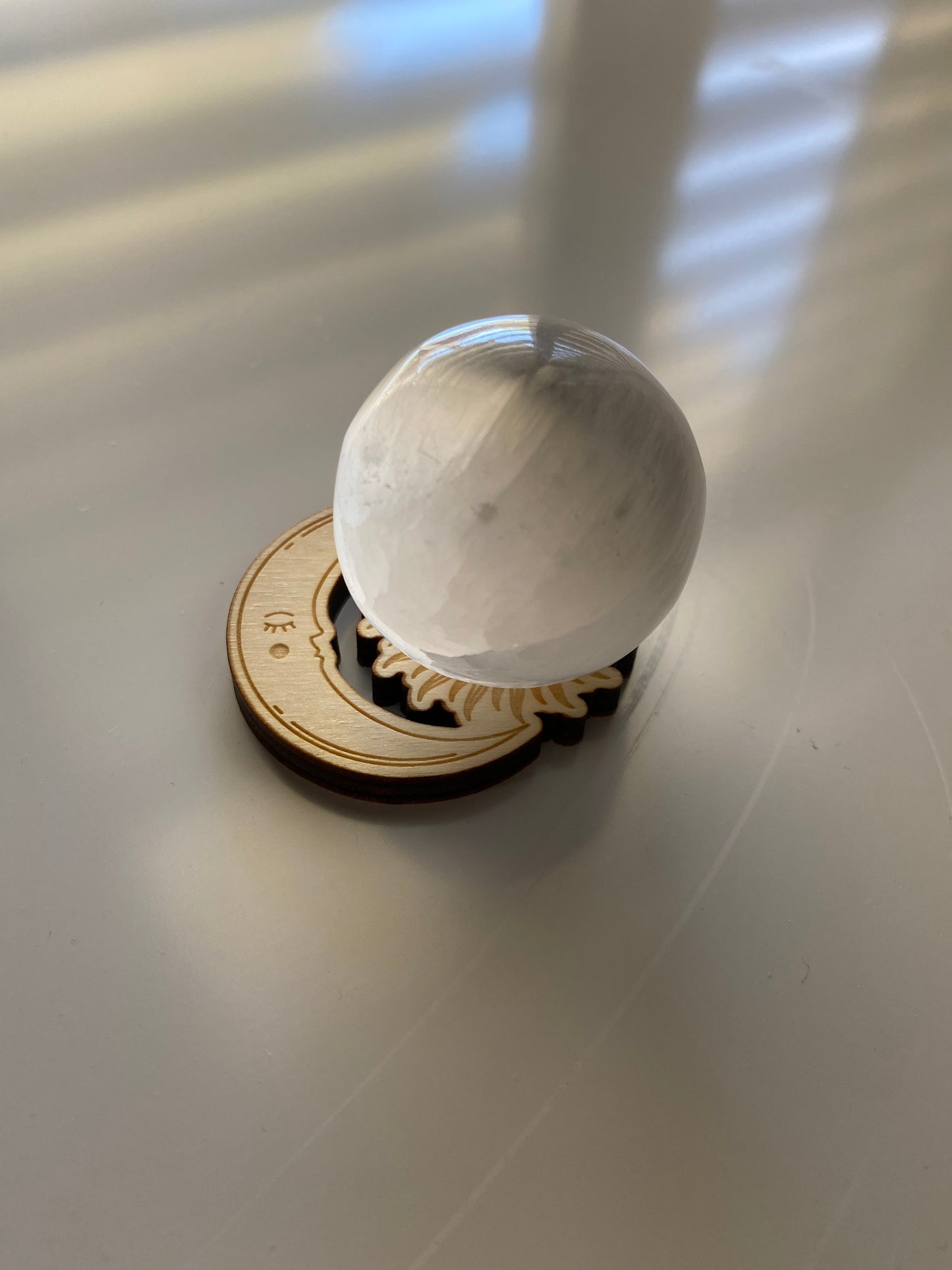 wooden sun/moon sphere stand